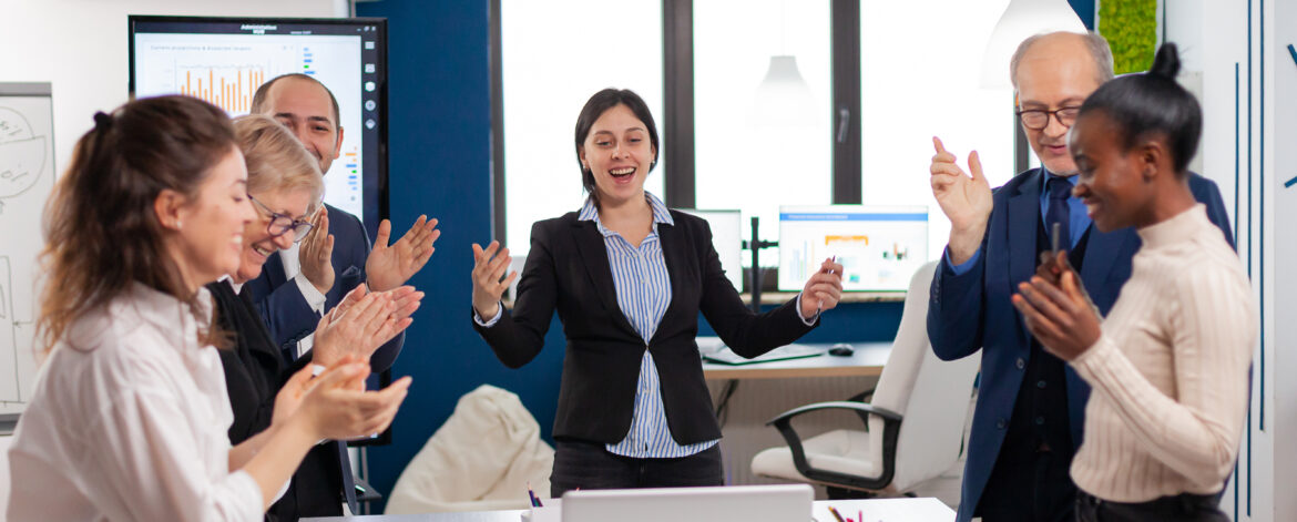 Motivated happy diverse business team people clapping